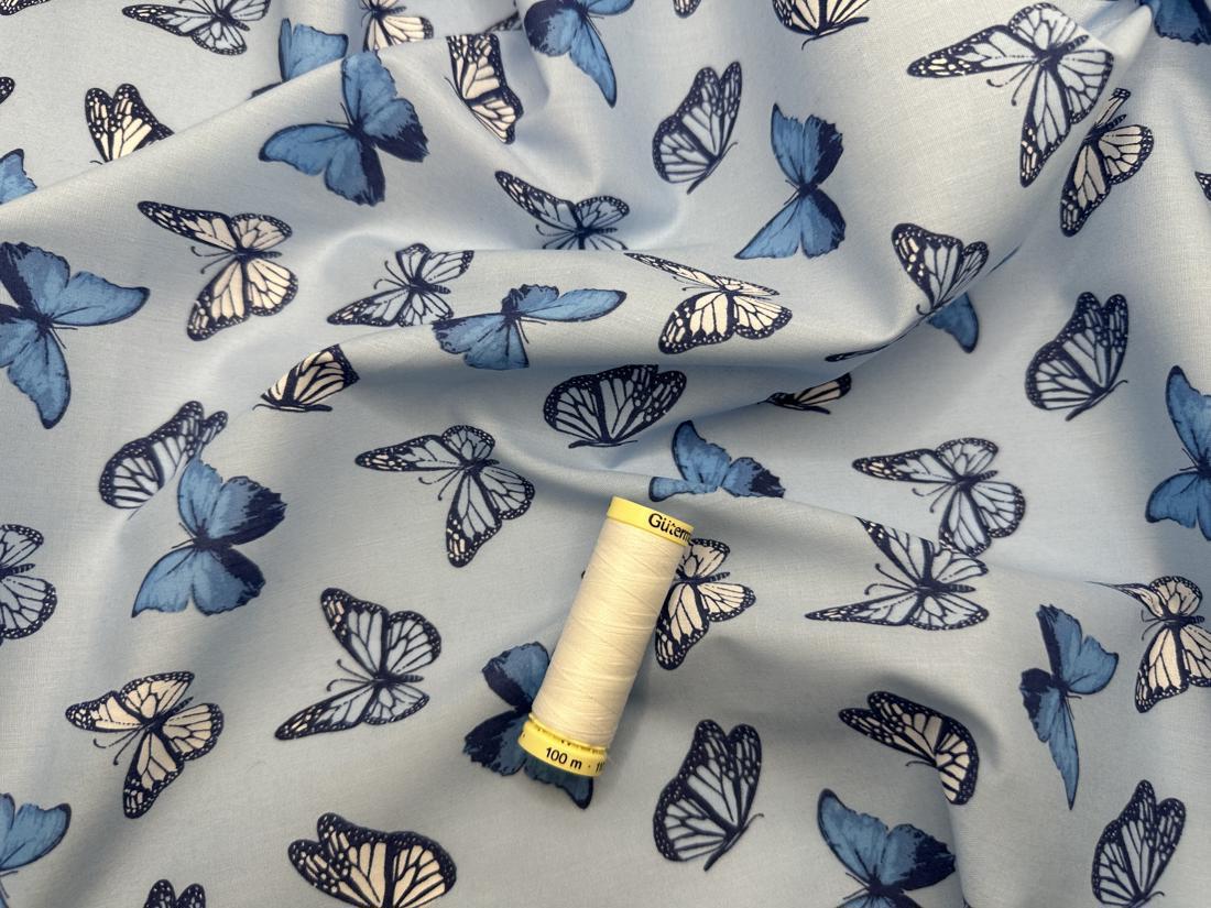 Butterflies on a Denim Background Poly Cotton