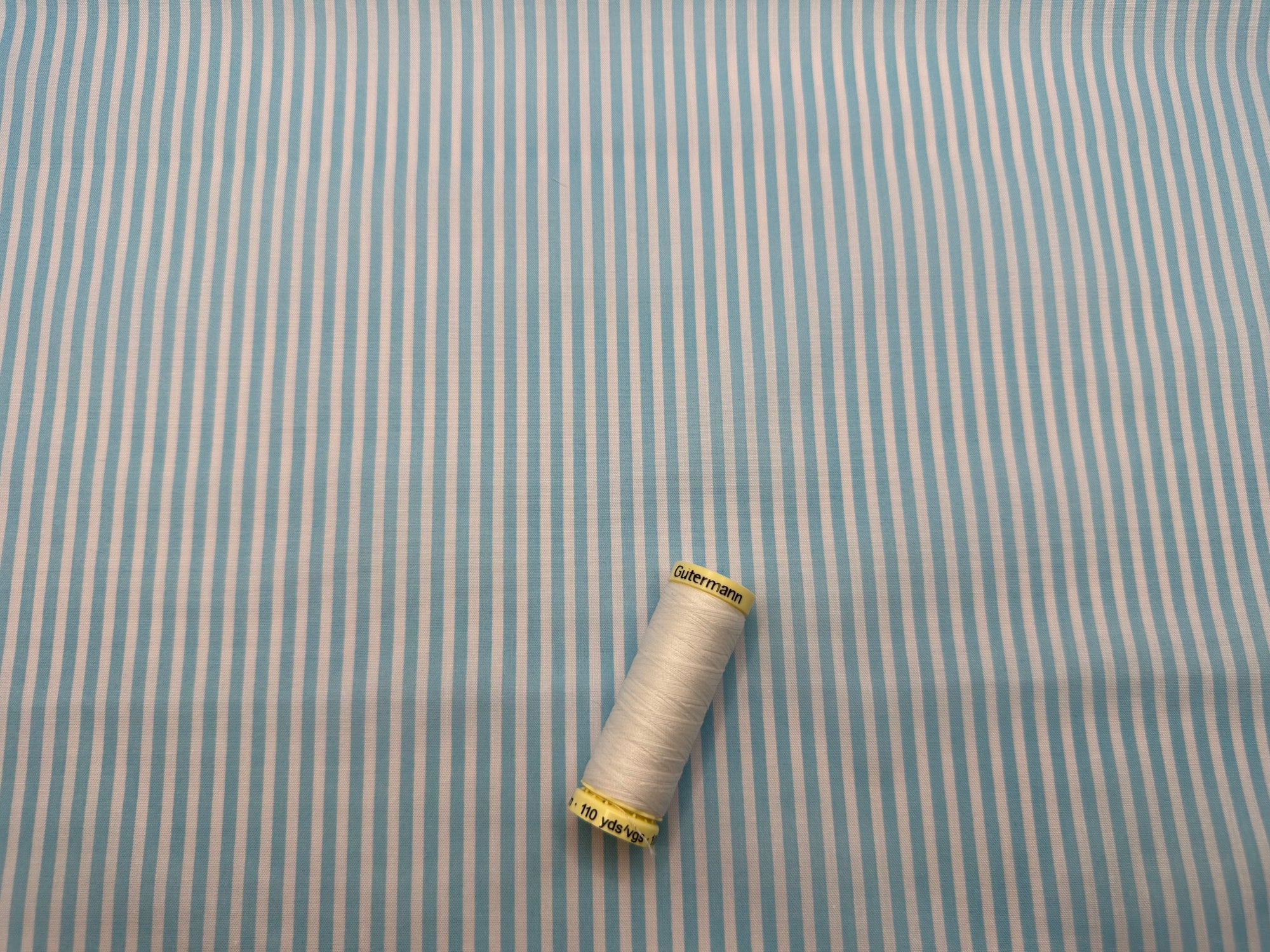 Candy Stripe 3mm on a Sky Blue Background Poly Cotton