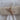 Rolled plain natural 100% cotton fabric tied with twine on white background