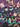 Stack of Hip Hop Floral Mix 100% cotton fat quarter fabric pieces with colorful floral patterns for quilting and crafts