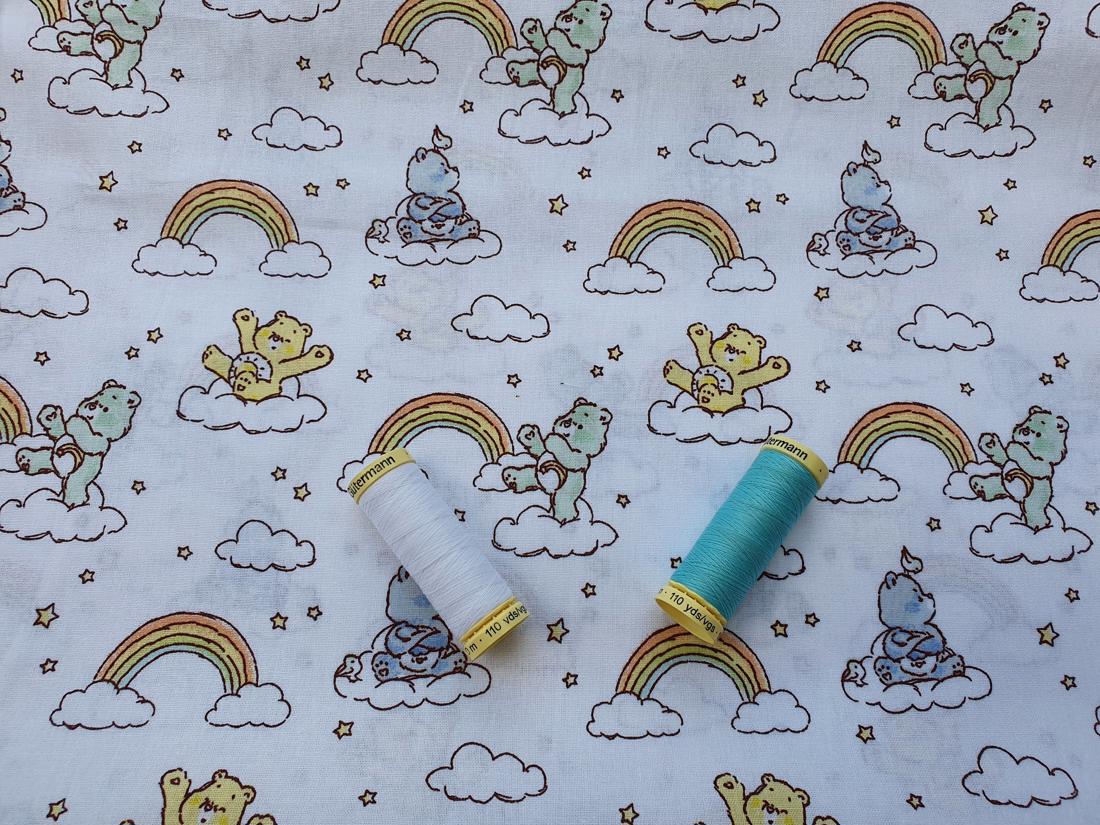Care Bears Rainbows & Bears on a White Background - Licensed 100% Cotton