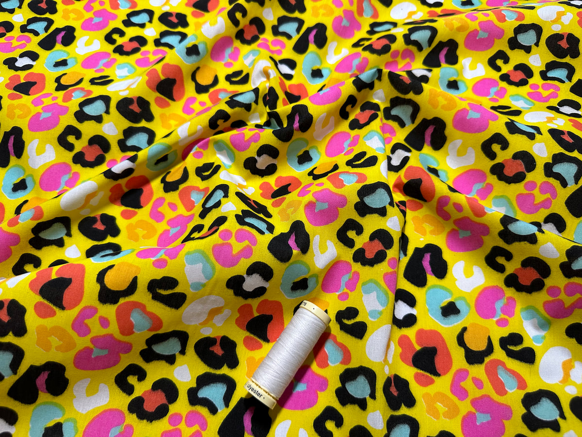 Bright Colorful Animal Leopard Print on a Yellow Background Poly Cotton