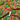 Retro Multi Floral Mix on a Peach Background Poly Cotton