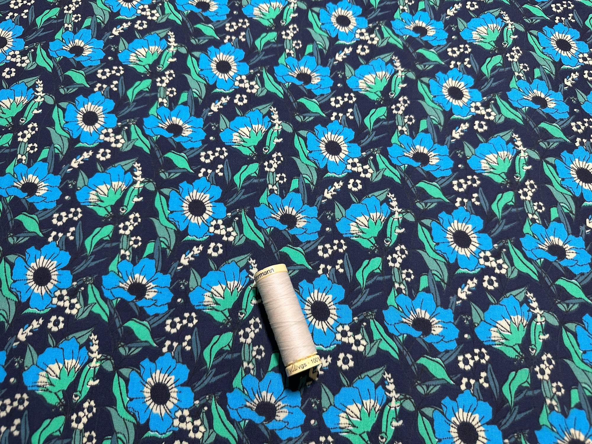 Retro Field of Flowers on a Navy Background Poly Cotton