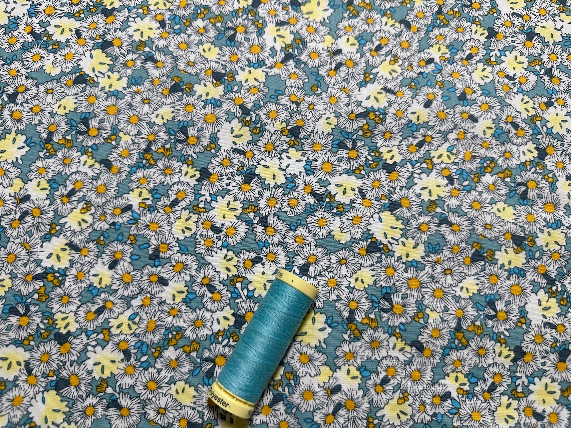 Field of Pretty Little Daisies on a Aqua Background 100% Cotton