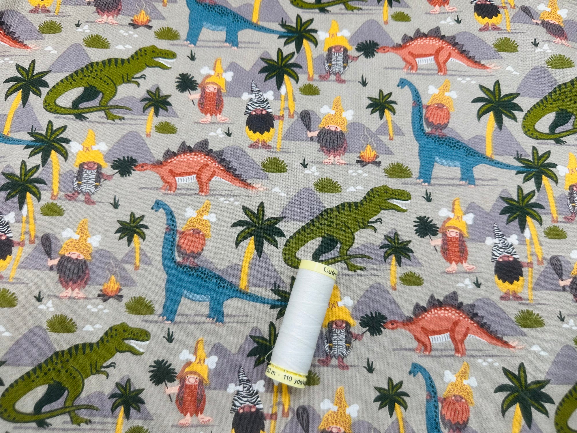 Gnomes and Dinosaurs on Grey 100% Cotton