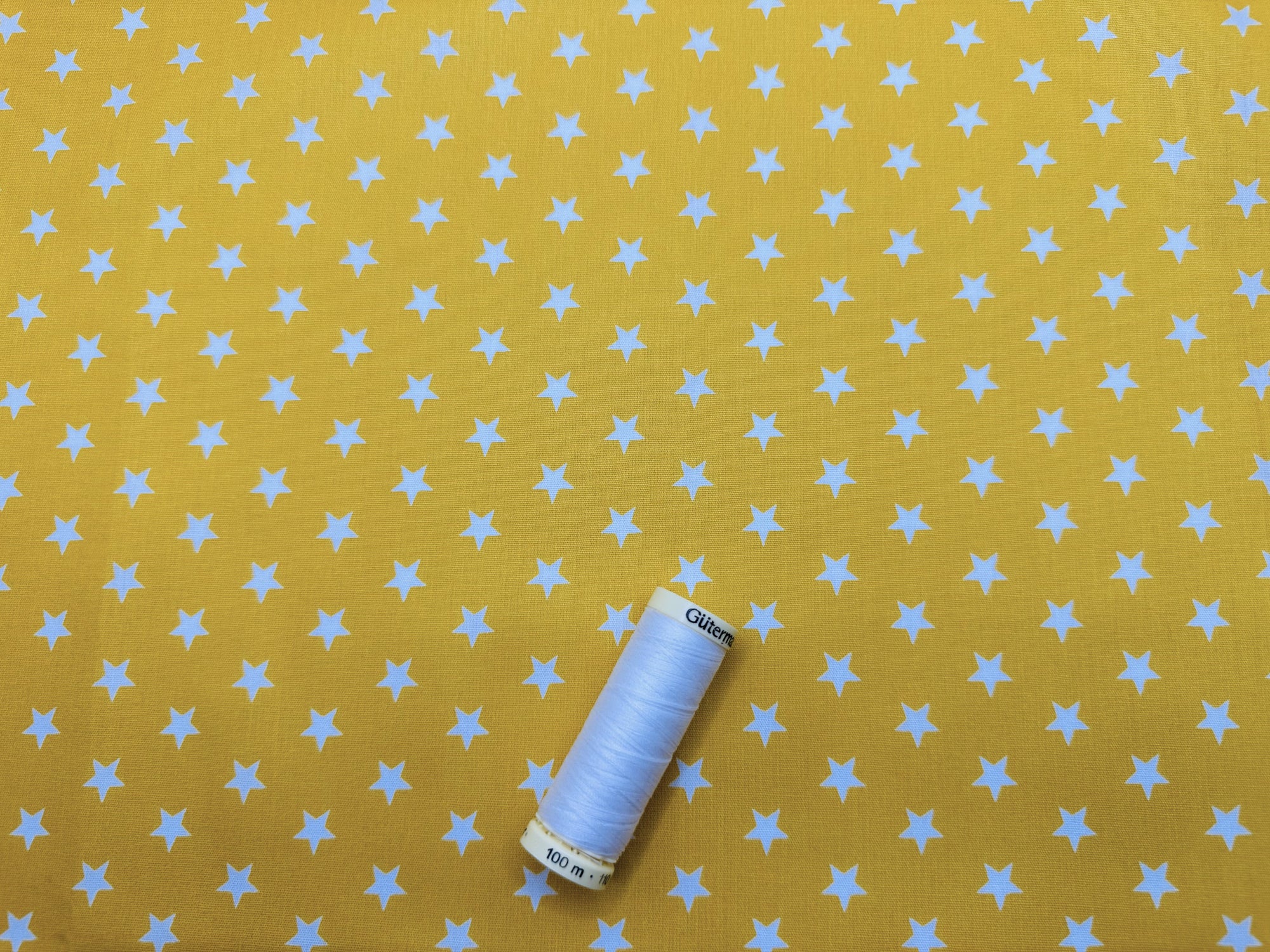 Stars 8mm White on a Bright Yellow Background 100% Cotton