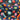 Space-themed fabric with bright multicolor planets and starbursts on a blue and black background, 100% cotton, soft and lightweight.