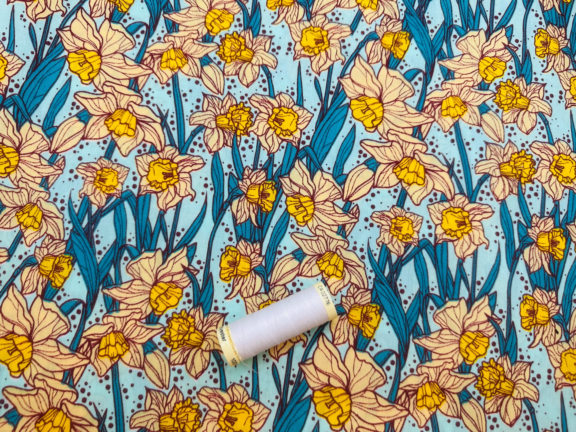Bright Colorful Daffodils on Sky Blue Poly Cotton