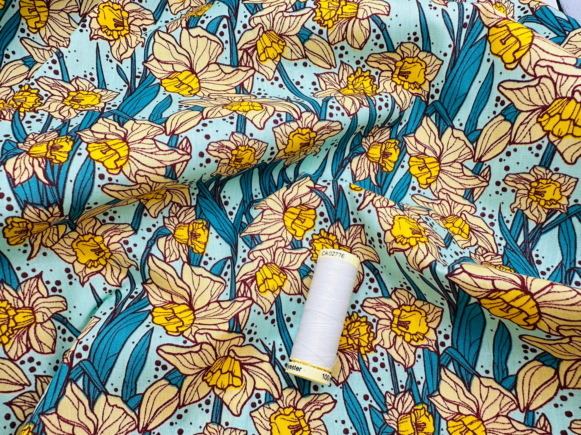 Bright Colorful Daffodils on Sky Blue Poly Cotton