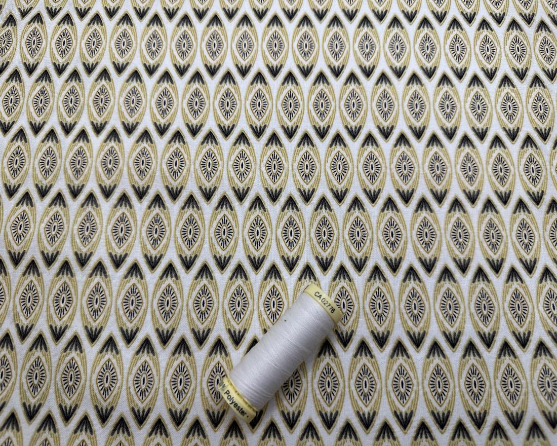 Stone Branch Oval Tile Design on a Ivory Background 100% Cotton