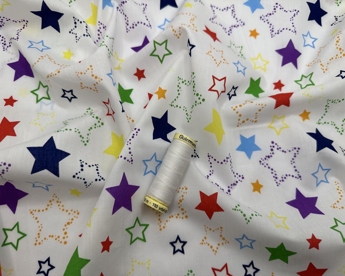 Bright Multi Color Stars on a White Background Poly Cotton