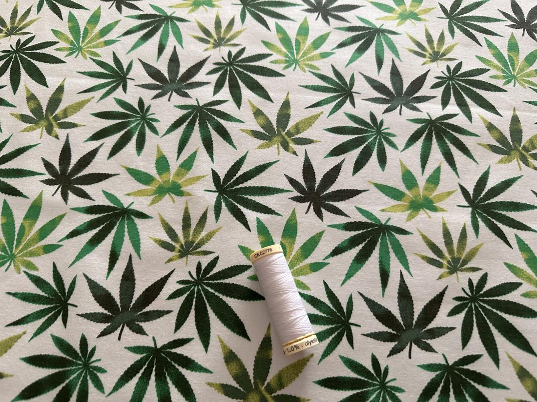 Multi Color Green Leaves on a Ivory Background 100% Cotton