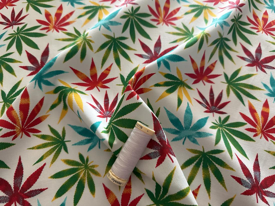 Multi Color Leaves on a Ivory Background 100% Cotton