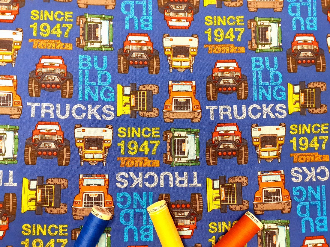 Tonka Trucks Building on a Royal Blue Background 100% Cotton Licensed