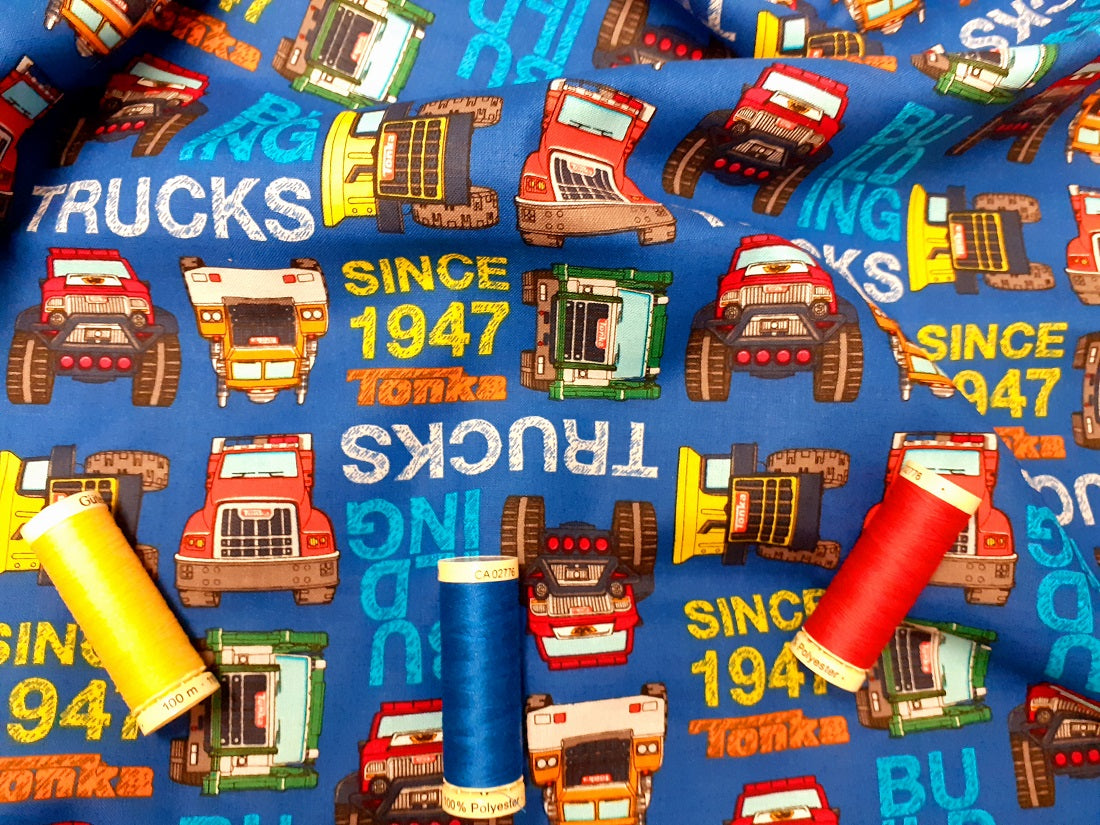 Tonka Trucks Building on a Royal Blue Background 100% Cotton Licensed