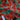 Close-up of bright red poppies digital print on soft 100% cotton fabric with green background.