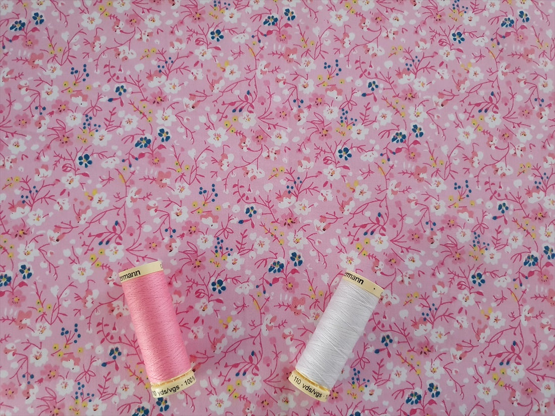 Pretty Little Floral Design Pastel Colors on a Candy Pink Background Poly Cotton