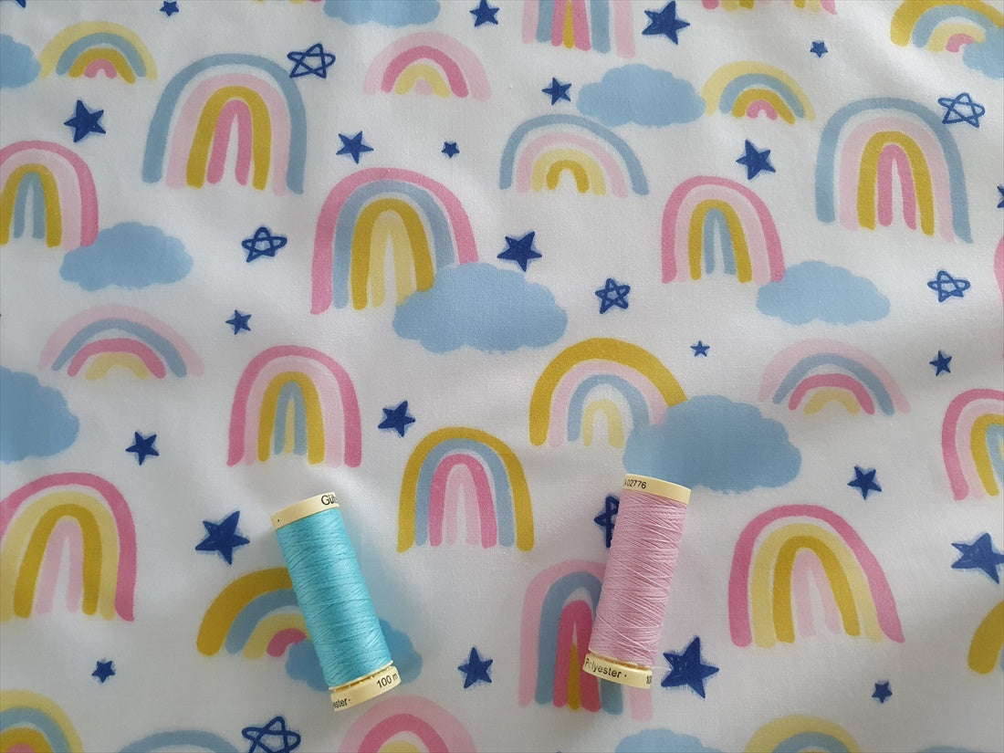 Pastel Rainbows & Clouds on a White Background Poly Cotton