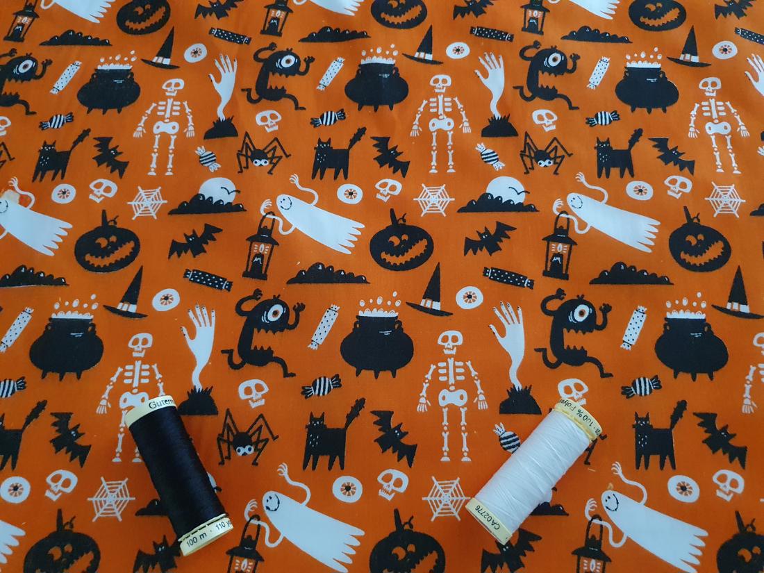 Halloween Scary Assortment Black & White on a Orange Background Poly Cotton