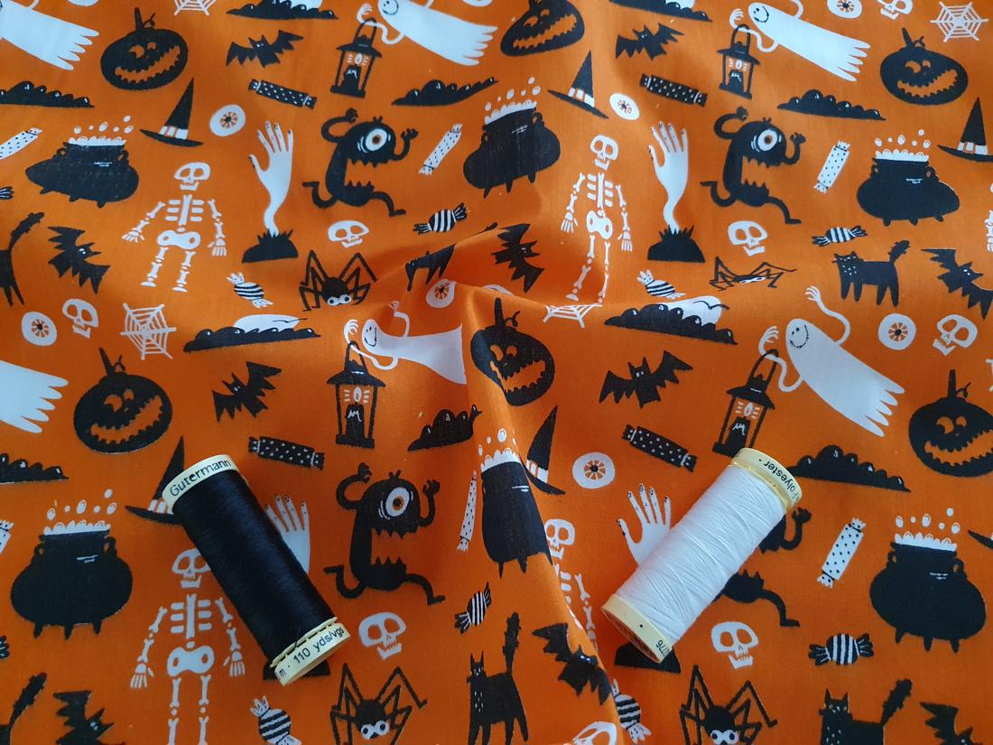 Halloween Scary Assortment Black &amp; White on a Orange Background Poly Cotton