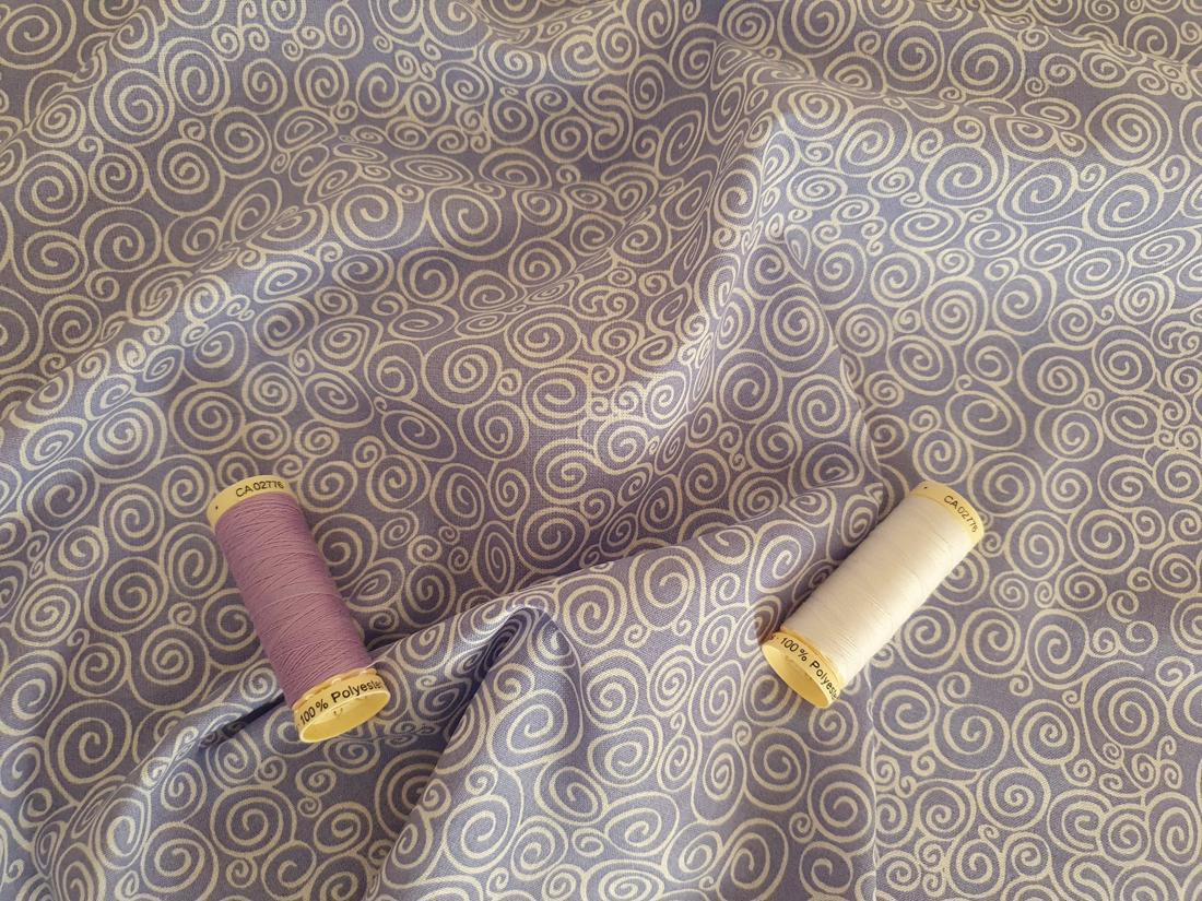 Scrolls on a Lavender Background 100% Cotton