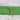 Folded plain lime green 100% cotton fabric tied with natural twine on a white surface