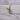 Plain white 100% cotton fabric roll tied with natural twine, ideal for crafts and sewing projects, approximately 150cm wide