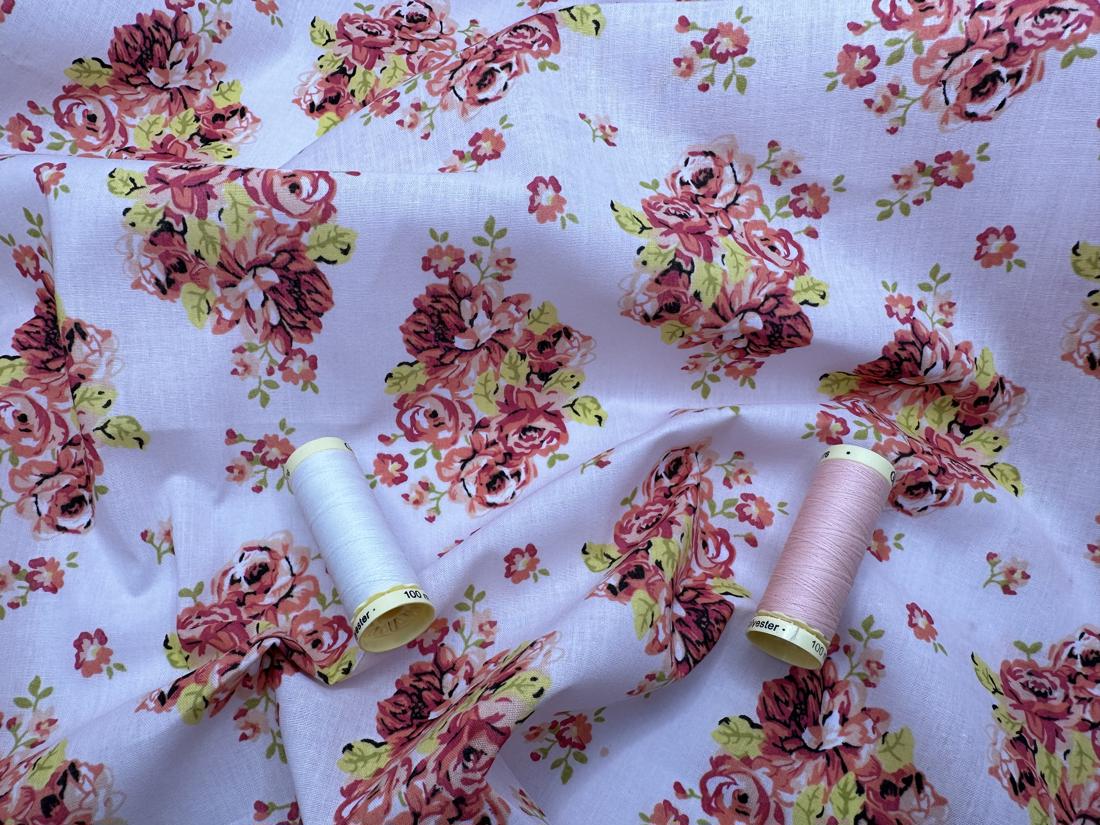 Vintage Floral Design on a Light Pink Background Poly Cotton