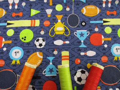 Sports Day Footballs, Tennis Rackets, Trophies etc... on a Denim Blue Background 100% Cotton